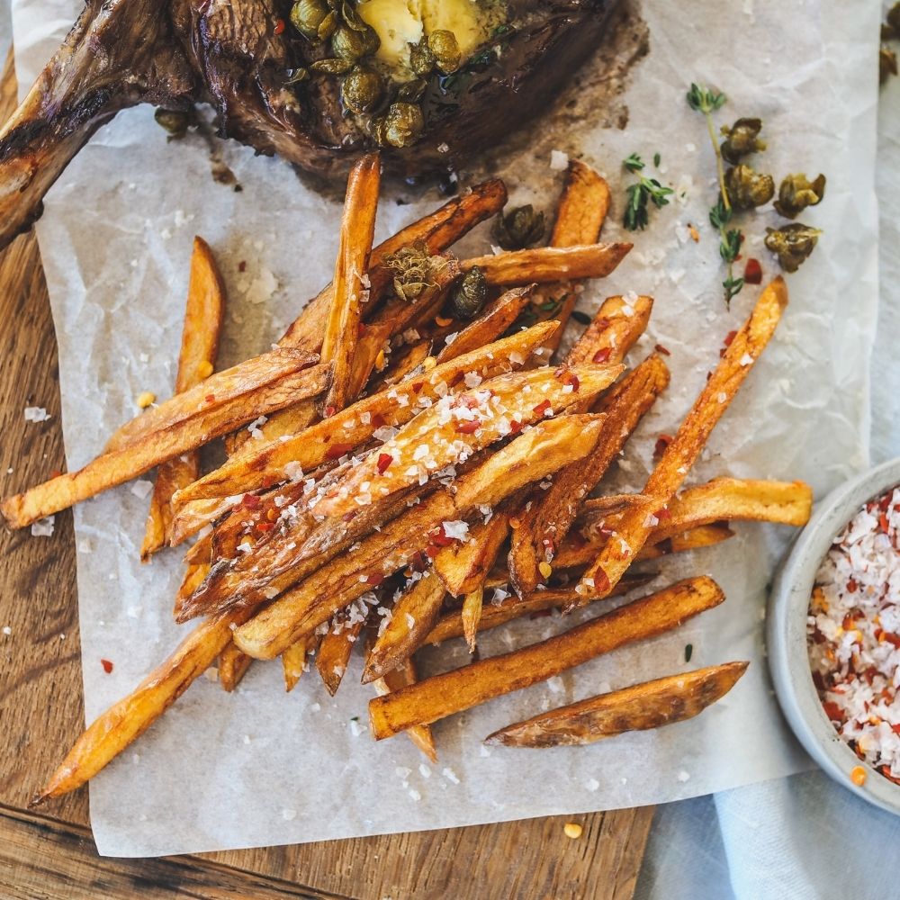 Rib on the Bone with Caper and Anchovy Butter