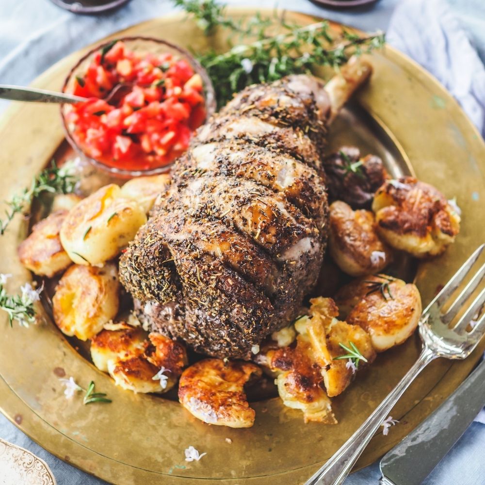 HERB ROASTED EASY CARVE LAMB SMASHED OLIVE OIL POTATOES