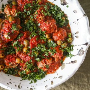 CHICKEN, KALE AND FETA DUMPLINGS WITH SICILIAN OLIVES