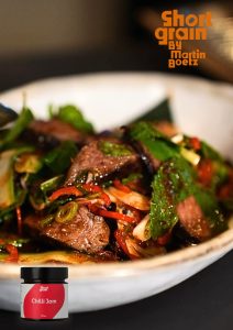 Wagyu Rump Salad with Coconut & Chilli Jam Dressing Tiger prawns with fresh herbs, coconut and a tangy coconut-chilli jam dressing recipe card header